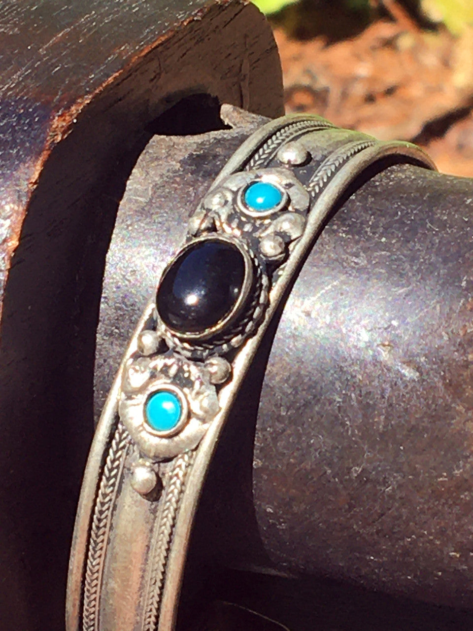 White Metal Onyx Bracelet with Teal Stones