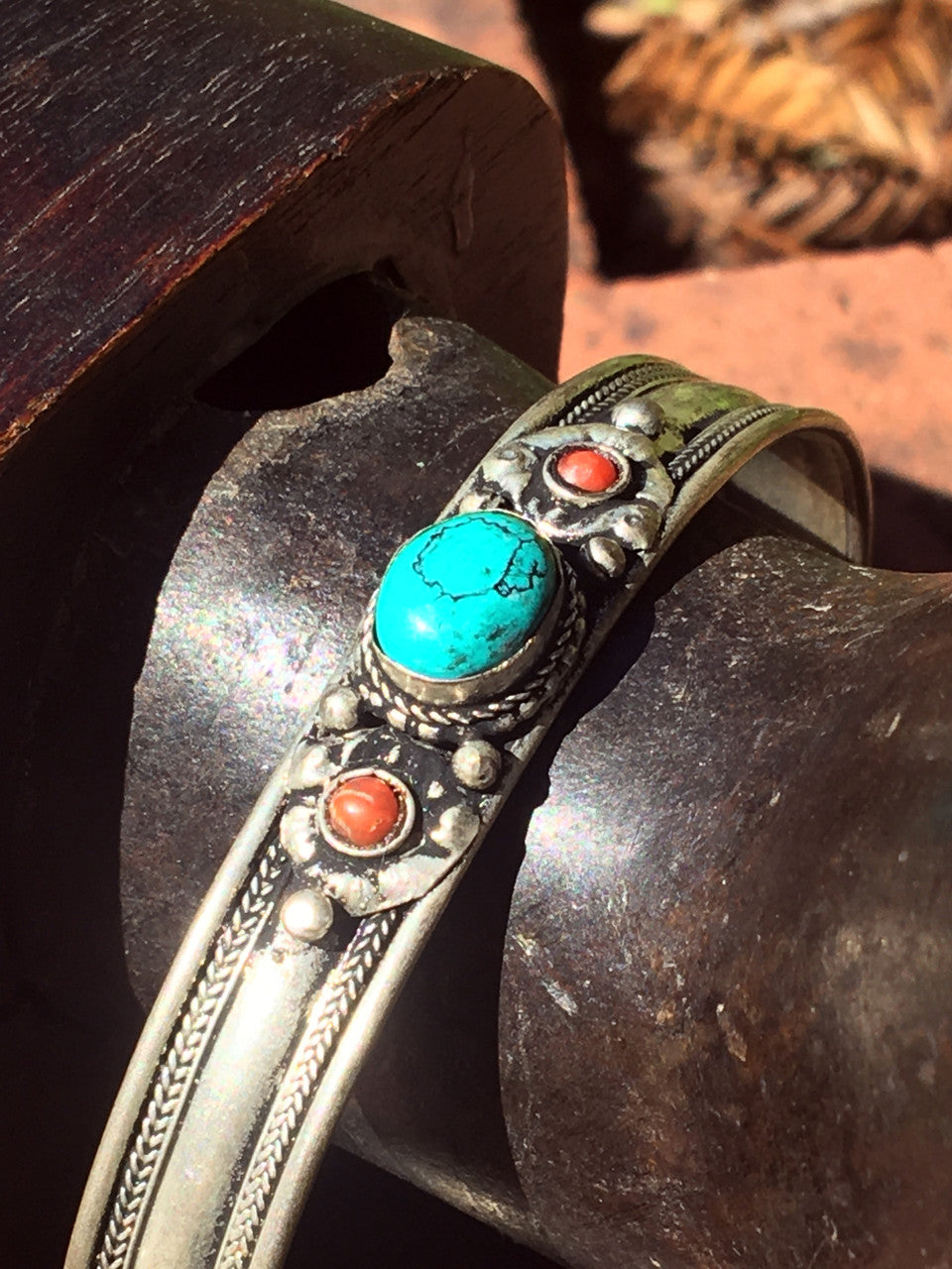 White Metal Turquoise Bracelet with Red Stones